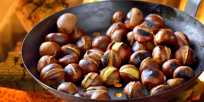 Castanha Assada also called as baked chestnuts